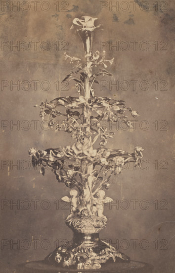 A photograph of a silver centerpiece or 'coupe de mariage' crafted by the Amsterdam silversmith