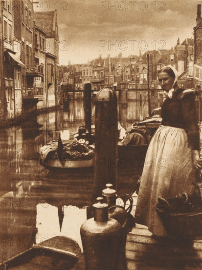 Woman with a basket on a pier in a harbor, photograph, 1850 - 1900, photographer, paper,