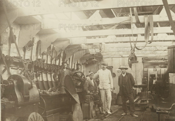 Machine shop, photograph, Interior of a machine shop. Photo pasted on cardboard, without texts.