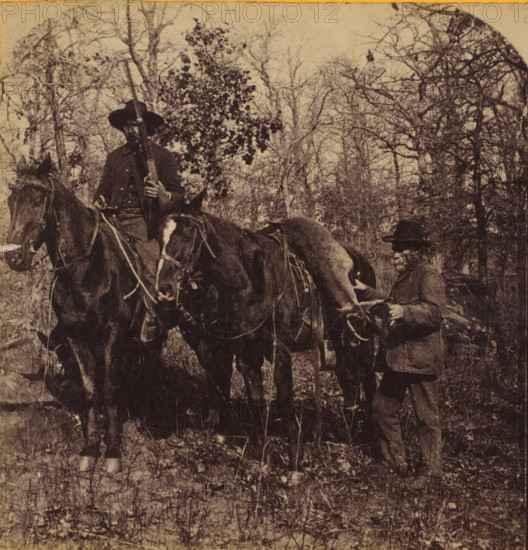 In the Boschveld, Two men on horseback with a shot hartebeest in South Africa, Faces and landscapes