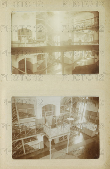 Interior of Oslebshausen prison with prison guards on a walkway, photograph, Part of Photo album of