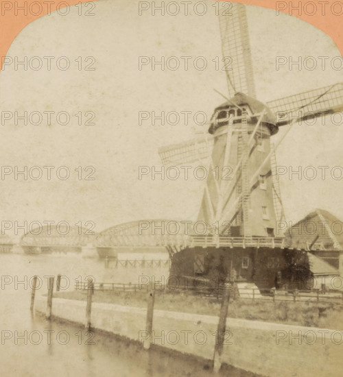 Vue prize a Dordrecht, View of a mill and the railway bridge over the Oude Maas near Dordrecht,