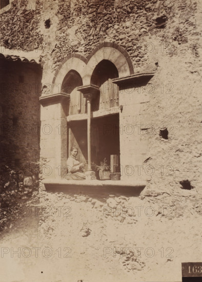 Unknown woman in a window, presumably in Italy, photograph, number: '163', photographer: Giovanni