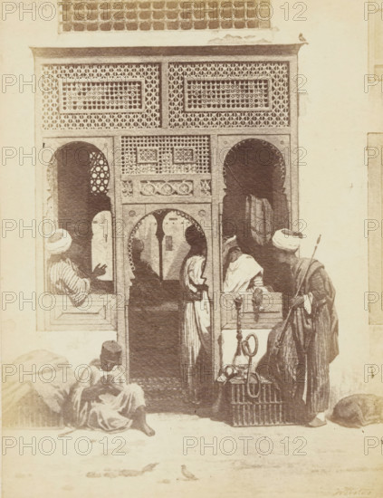 Photo reproduction of the painting 'A barber's shop in Cairo' by Willem de Famars Testas,