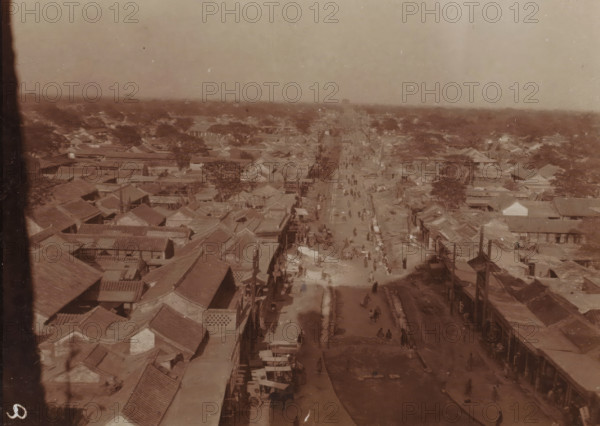 Bird's-eye view of a long shopping street in a vast city, China, photograph, inscription: