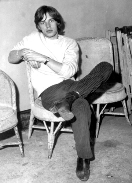 Mick Jagger sitting backstage, 21 September 1964.