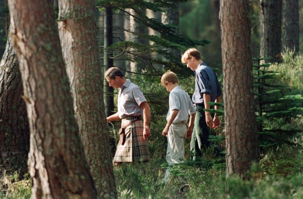Prince Charles with sons Prince William and Prince Harry. Pictured on the banks of the River Dee at
