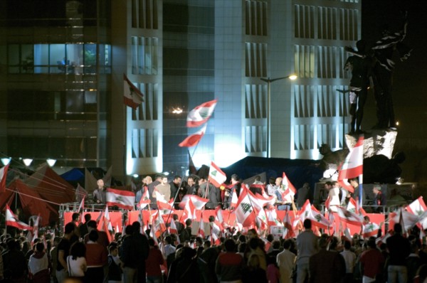 Lebanese protestors celebrate victory at Martyr's Square in Beirut
