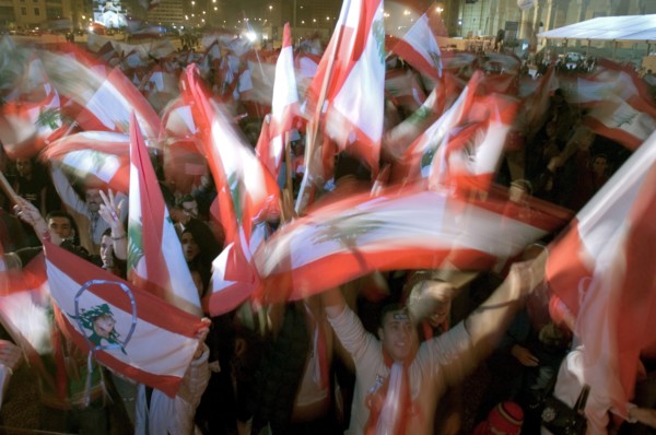 Lebanese protestors celebrate victory at Martyr's Square in Beirut