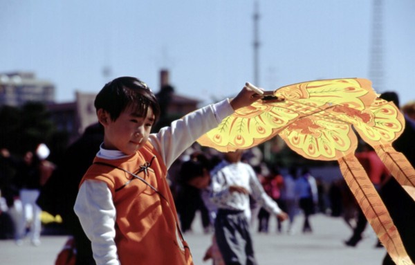 A girl flying a kite