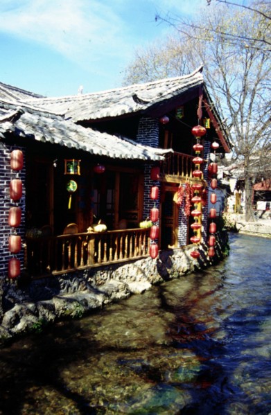 Residence house by the side of water in the old town of Lijiang