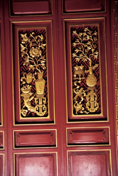 Lijiang, Yunnan Province, wooden carvings, China