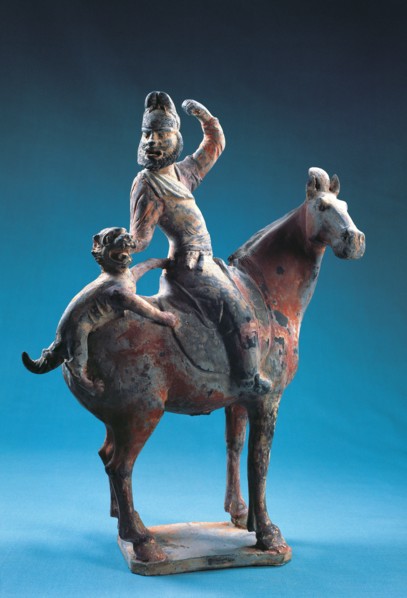 Sculpture peinte représentant un chasseur