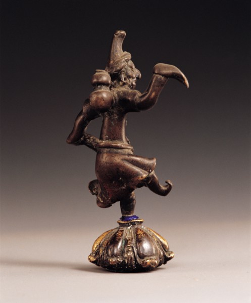 Statuette en cuivre, personnage de style Perse, découvert dans le Gansu