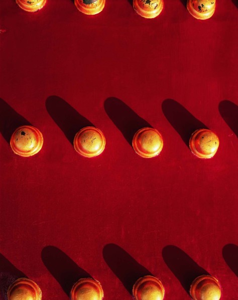 The knob on the red painted gate of the Forbidden City,Beijing,China