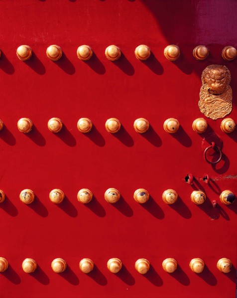 The knob on the red painted gate of the Forbidden City,Beijing,China