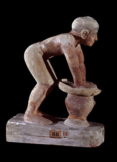 ESTATUA DE HOMBRE FABRICANDO CERVEZA-CALIZA DEL  IMPERIO ANTIGUO V DINASTIA PROCEDE DE SAQQARA. 40