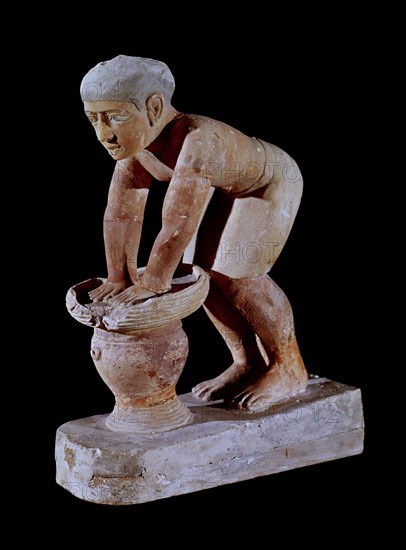 ESTATUA DE HOMBRE FABRICANDO CERVEZA-CALIZA DEL  IMPERIO ANTIGUO V DINASTIA PROCEDE DE SAQQARA. 40