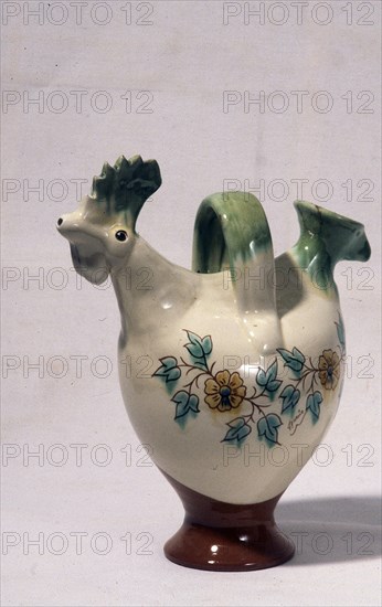 BOTIJO ESMALTADO EN FORMA DE GALLINA CON DECORACION VEGETAL - S XX - ARTE POPULAR
SALVATIERRA