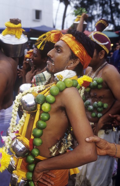 Hindu man with piercings at Thai Pusam in Kuala Lumpur