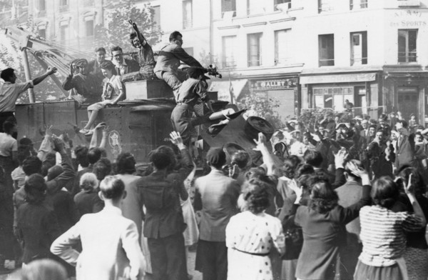 Scene of cheering crowd in the streets of Paris, during the Liberation (August 1944)