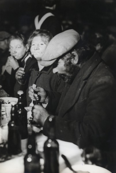 Homeless people during a Christmas eve dinner offered by the Salvation Army, 1931