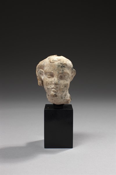 Tête de statuette représentant un jeune garçon