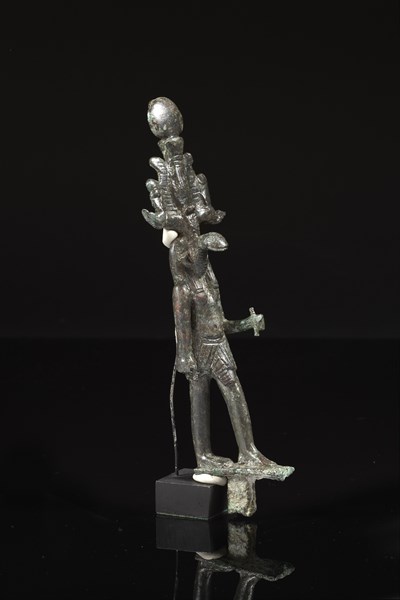 Statuette votive représentant un dieu à tête de serpent, probablement Nehebkaou