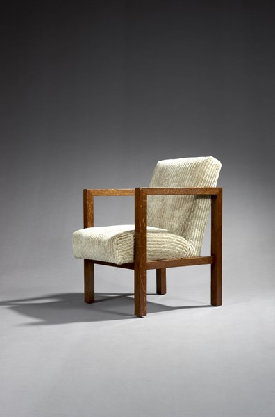 Armchair with sloping back