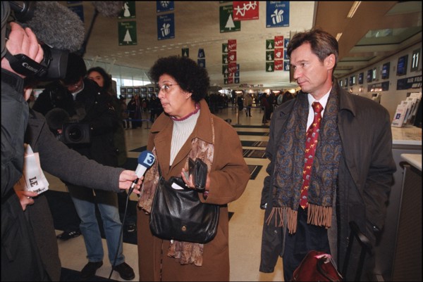12/27/2001. EXCLUSIVE: Alleged WTC terrorist Zacarias Moussaoui's mother Aicha leaves for Washington with her son's new lawyer François Roux.