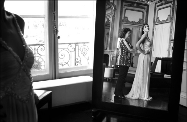05/00/2003. EXCLUSIVE Clotilde Courau tries gowns on at Valentino's before the 56th Cannes Film