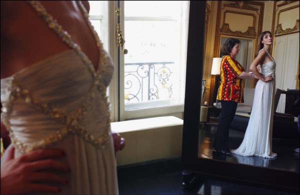 05/00/2003. Clotilde Courau tries gowns on at Valentino's before the 56th Cannes Film