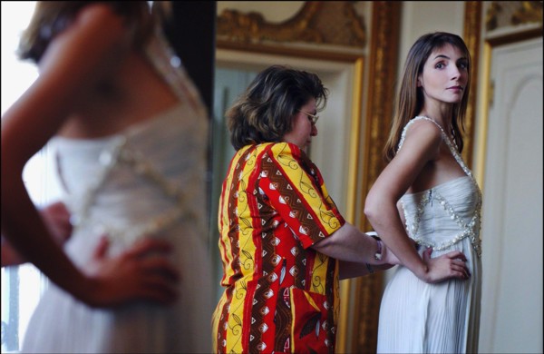 05/00/2003. Clotilde Courau tries gowns on at Valentino's before the 56th Cannes Film
