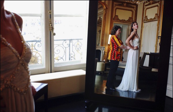 05/00/2003. Clotilde Courau tries gowns on at Valentino's before the 56th Cannes Film