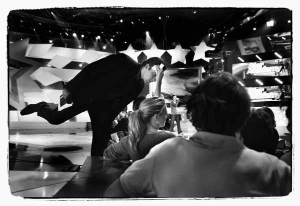 12/00/2003. Nikos Aliagas, host of the Star Academy shows backstage and on stage.