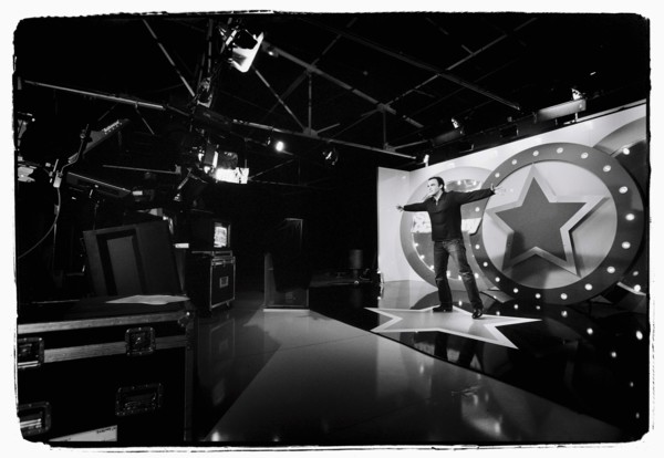 12/00/2003. Nikos Aliagas, host of the Star Academy shows backstage and on stage.