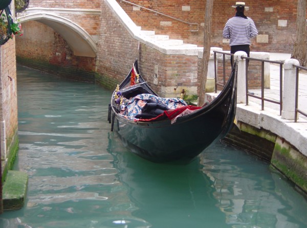 Venice. Gondola alongside the quay