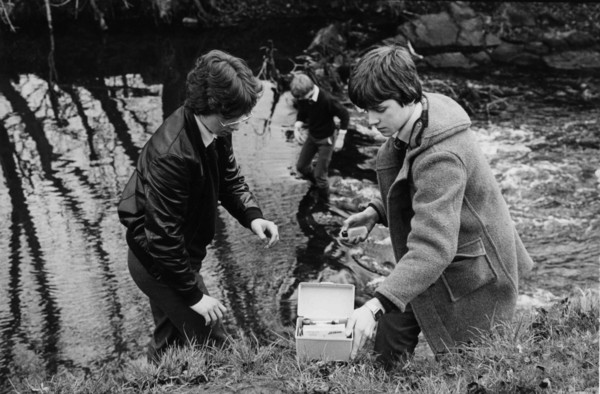 School boys measuring water quality in Rye, Leixlip, Co Kildare