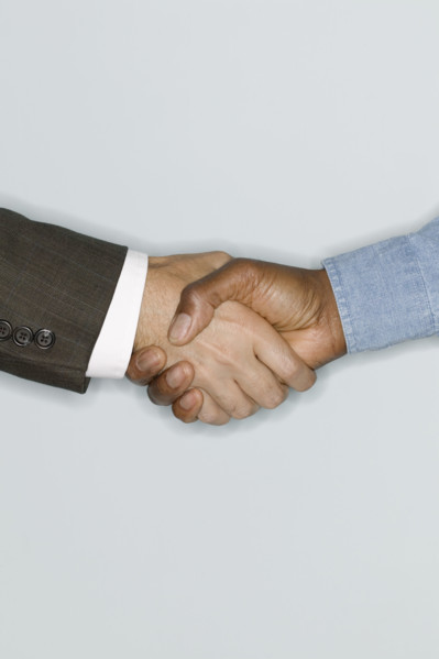 Two men shaking hands.