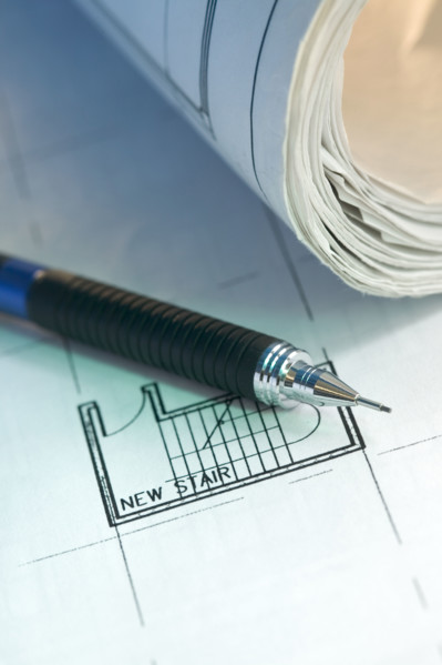 Architectural tool and blue prints.