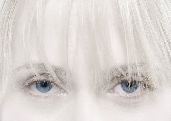 Closeup of fair woman's eyes.
