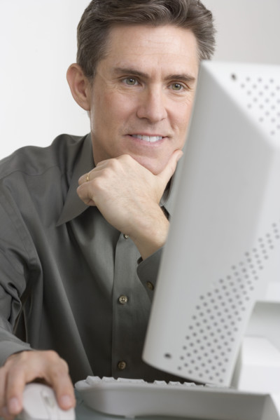 Businessman working at computer.