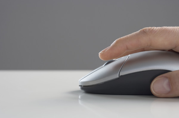 Profile of hand on mouse.