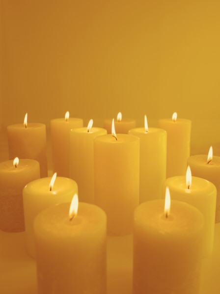 Still life of lighted candles.