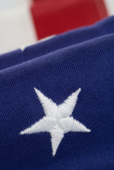 Closeup of star on American flag.