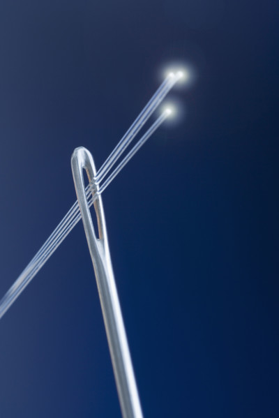 Needle with fiber optic threads.