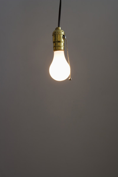 Closeup of bare light bulb.