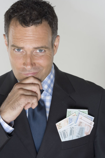 Man with a pocketful of Euros.
