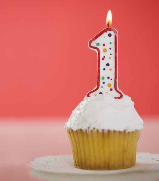 One candle on a cupcake.