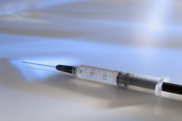 Closeup of hypodermic needle.